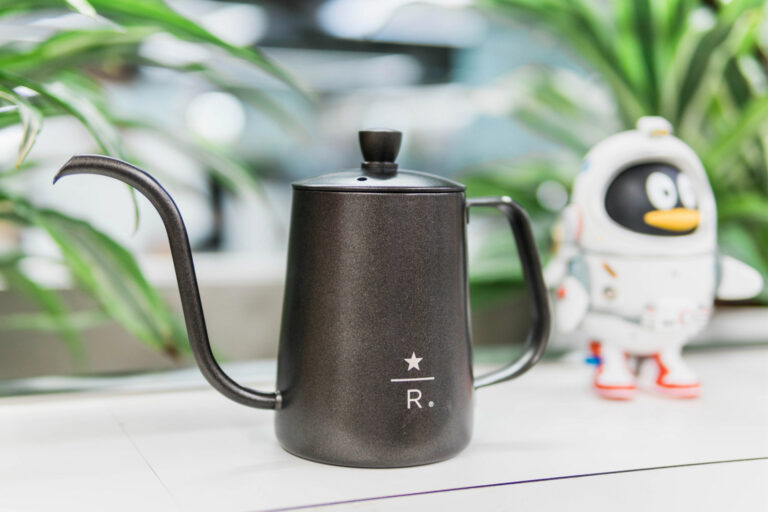 Why are coffee kettle designed with a gooseneck?