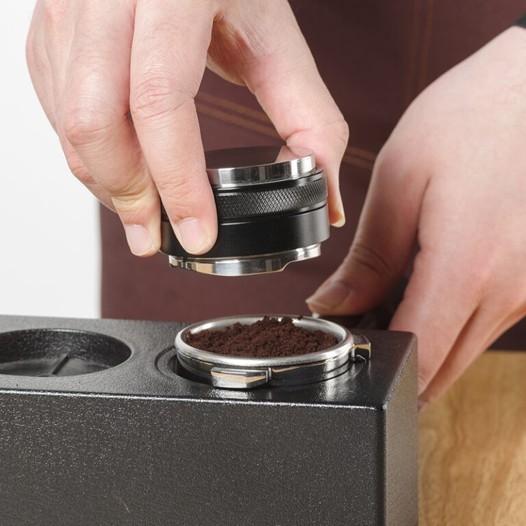 What are the functions of the coffee Distributor and the coffee tamper?